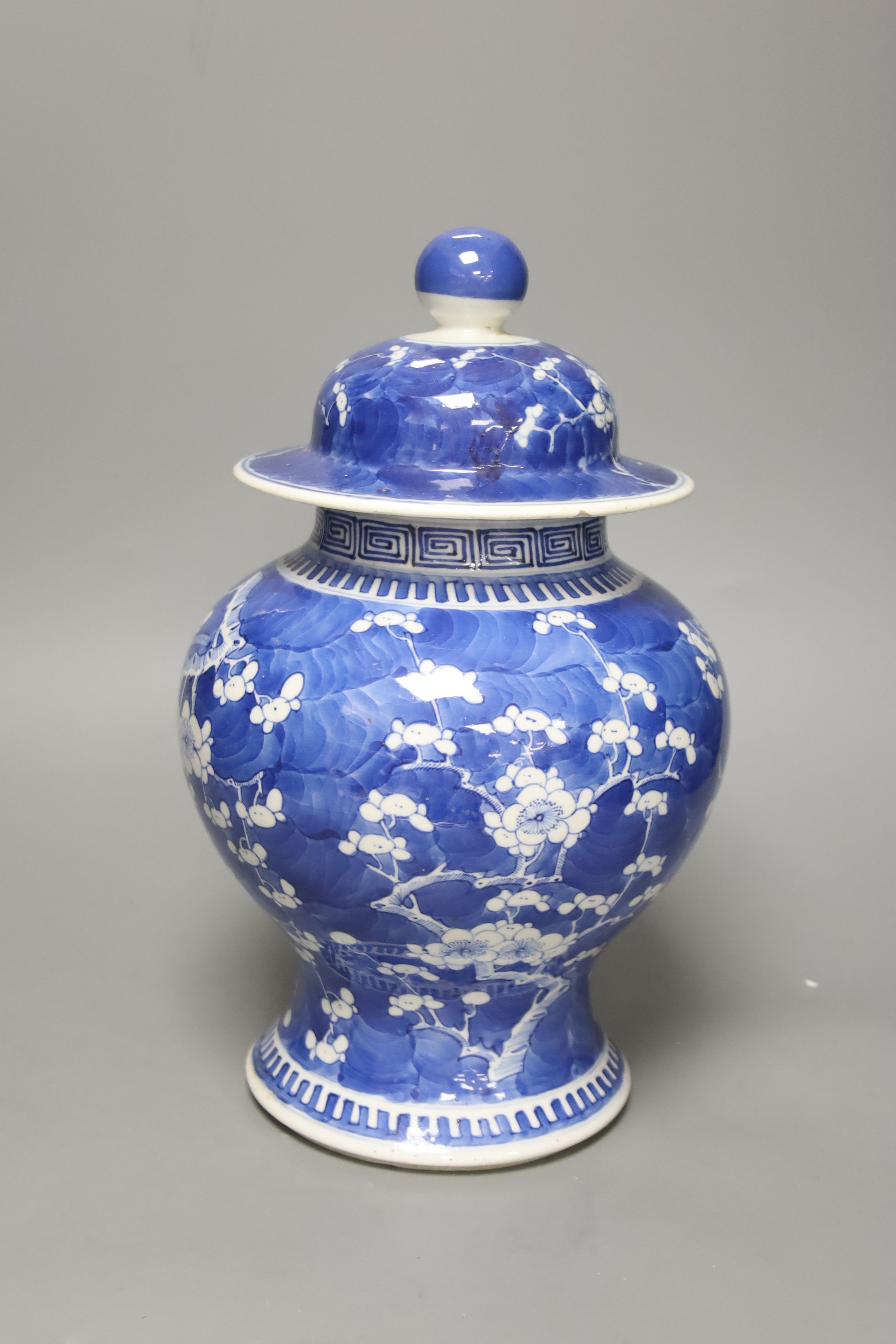 A 19th century Chinese blue and white prunus jar and cover, height, 33cm